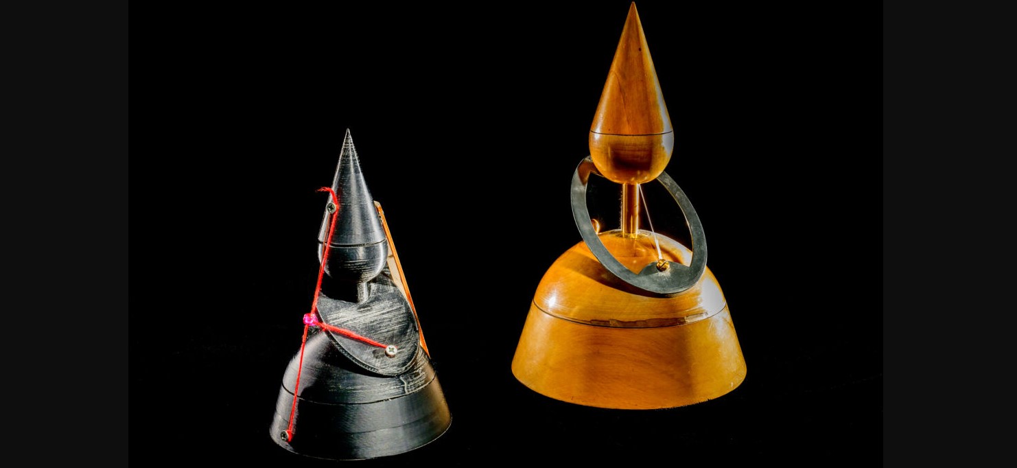 This moveable model offers a dynamic proof that the cross-section of a cone (at a suitable angle) is an ellipse. The spheres are called “Dandelin spheres.” Students 3D-printed a re-creation of the model, which the Illinois Mathematics Lab can use for its outreach activities to area schools. Photo by Fred Zwicky