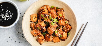 stir fried tofu in a bowl. Stock image from Arxont