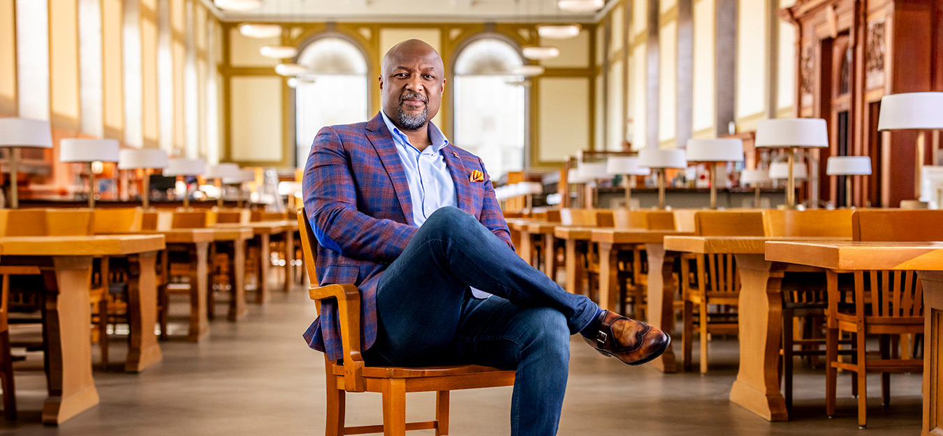 Chancellor Charles Isbell sits in the Reading Room at the library. Photo by Michelle Hassel