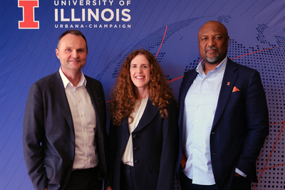 From left to right: Adam Tickell, University of Birmingham's vice-chancellor; Colleen Murphy, Illinois International’s vice provost for global engagement; and Illinois Chancellor Charles Isbell Jr., pose for a photo following a fireside chat on Oct. 5 inside the Illini Union.