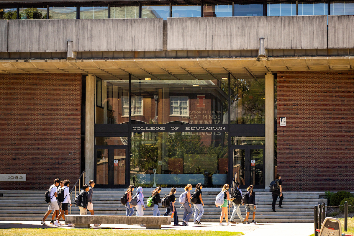 Photo shows students walking in front of the College of Education on the University of Illinois Urbana-Champaign campus.