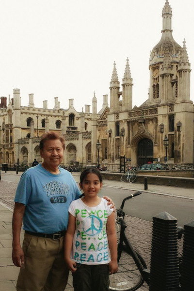 A young Zaree Ascan (right) poses for a photo with her grandfather (left).