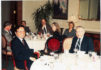 Ma Junru (l. front), previous Director of the State Administration of Foreign Experts Affairs, P.R.C., visited UIUC in fall 1993. He is pictured here with Fred Neumann, former Associate Dean for Academic Affairs in the College of Business at Illinois (r. front), UIUC.