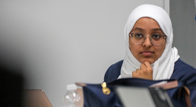 Asma Yahya, the grad assistant helping with the Oman Foundation Year at Illinois program this year, sits during a meeting with students on Oct. 27, 2023 inside the Siebel Center for Design.