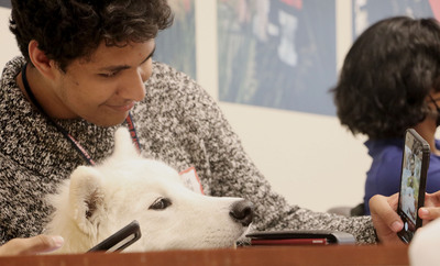 Student takes a photo with Kirby