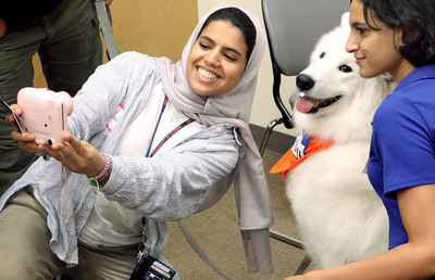 Student takes a selfi with Kirby