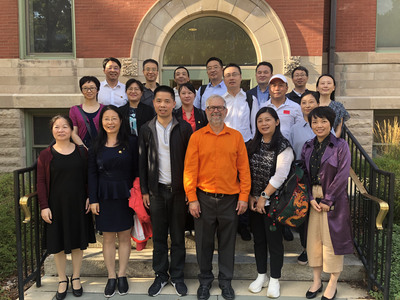 GET members stand outside the Illinois building