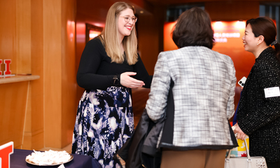 GET Coordinator Allison Wheeler greets guests during the 30-year anniversary event.