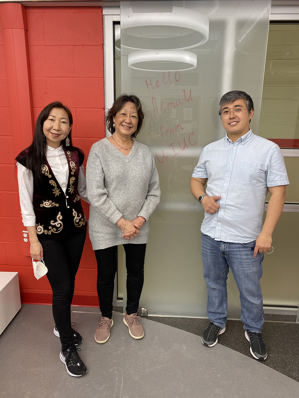 Aseel Aryn and Kaunysh Abeshev pose for a photo with fellow faculty member, Cheelan-Bo-Linn