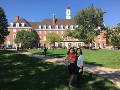 Photo of Karen Weng and Li Na standing in front of Illini Union building