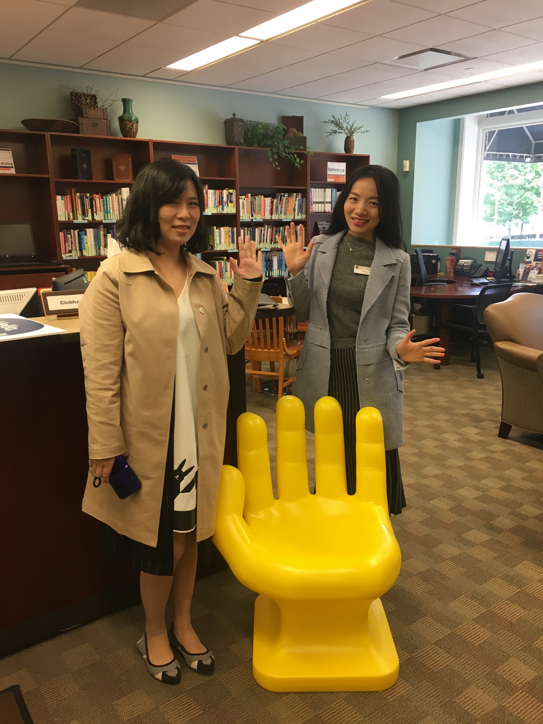 Photo of Karen Weng and Li Na standing in the Career Center office
