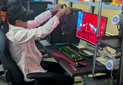 The 2024-2025 Humphrey Fellow cohort visited the Innovation Studio located in the Center for Innovation in Teaching & Learning. Here, one of the fellows is participating in a learning exercise with a virtual reality headset.