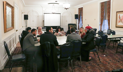 Participants speak with disability center mentors during a break-out session at the Amideast Egypt Study Tour on Feb. 14 inside the Illini Union.