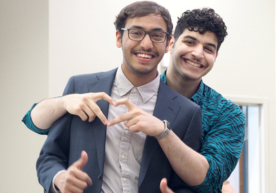 Hassan Mohammed H Al Lail (back) and Basil Faisal M Habiballah (front) pose for a photo following the May 18 KAUST recognition ceremony at the I Hotel.