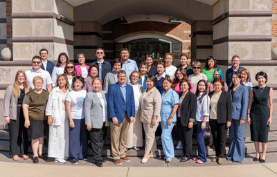 Members of Global Education and Training pose for a photo with participants in the Intensive Program in Education Team Building and Management in September 2025.