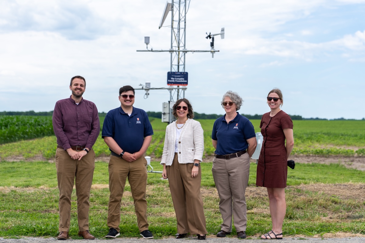 Illinois State Water Survey and Lumpkin Family Foundation staff pose for a photo in front of the new climate monitoring station.