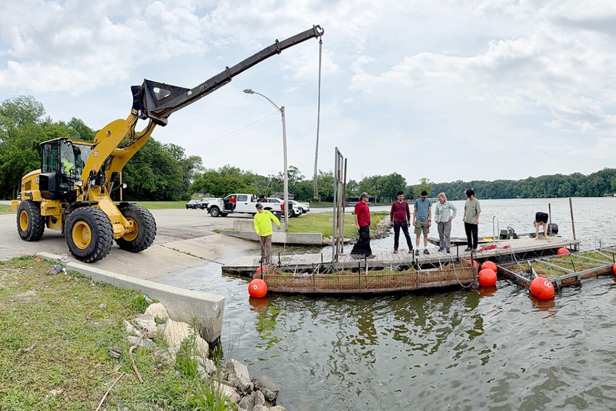 In June 2025, Illinois State Water Survey research scientist Erin Bauer and her colleagues built and installed two floating wetlands in Lake Decatur, Illinois. The project aims to evaluate the viability of floating wetlands and their potential effects on water quality, sedimentation and wildlife. Photo by Rafael Tinoco
