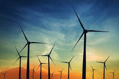 Turbine silhouettes at sunset.