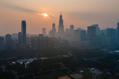 Aerial photo shows the Chicago skyline hazy with wildfire smoke.