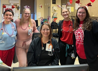 Cardiac rehab colleagues pose for a photo