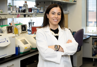 Sandra Pinho, UIC associate professor of pharmacology and regenerative medicine at the College of Medicine, poses in her lab. (Photo: Jenny Fontaine/UIC)