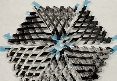 Continuous fiber 3D printer additively deposited fiber bundles generate the desired shape of a parabolic dish