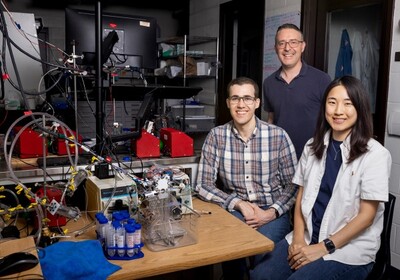 Urbana-Champaign engineers Paul Rozzi, professor Kyle Smith, and JeongA Lee have developed a new battery-type device that captures CO2 from the air. (Photo by Michelle Hassel)
