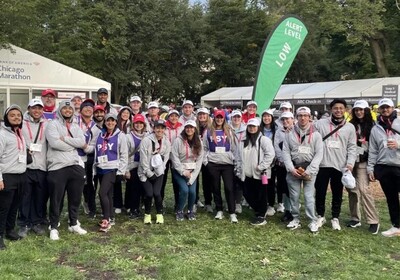 a group of people standing outside the Chicago Marathon